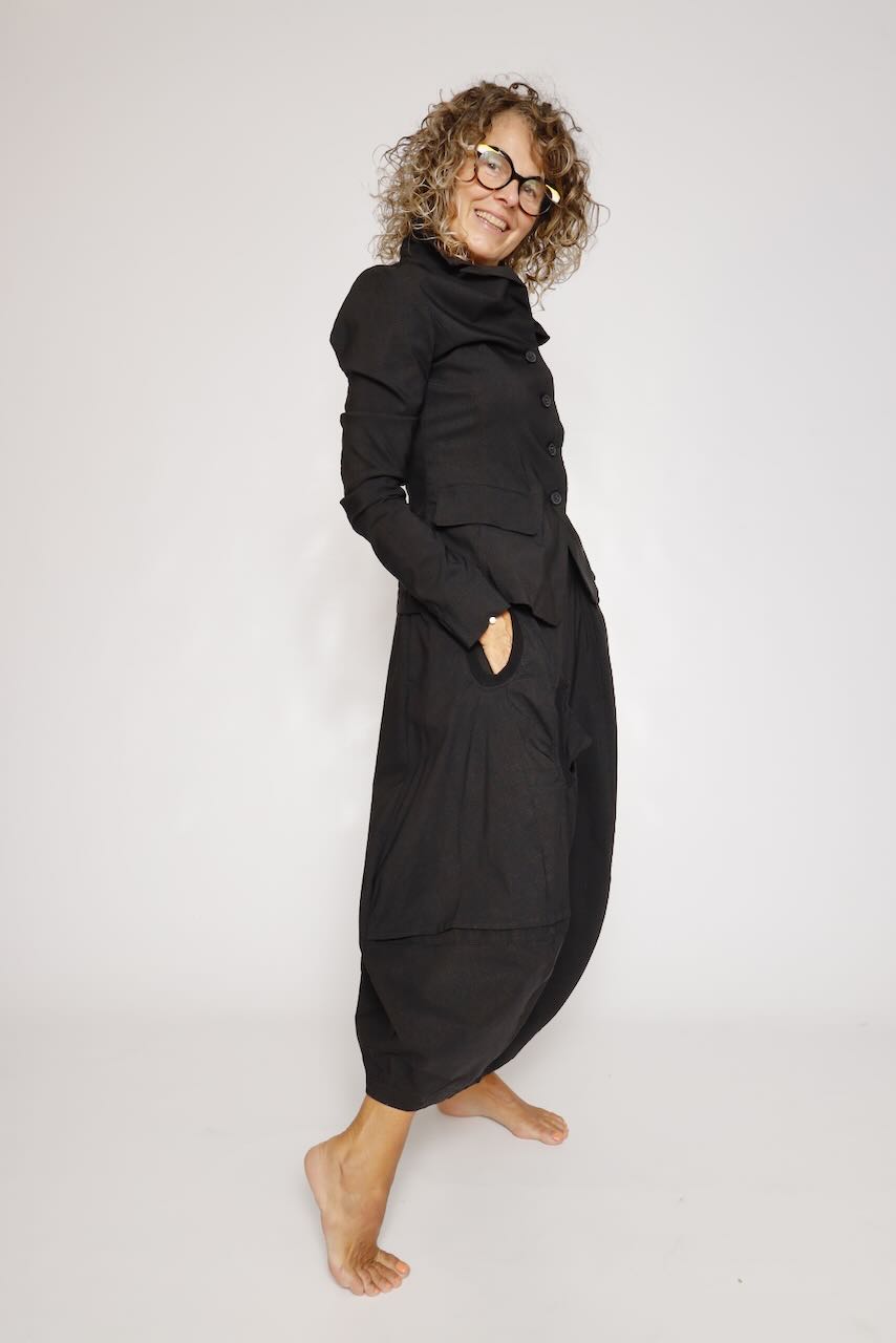 FALDA MIDI NEGRA CON BOLSILLO LATERAL 3440315