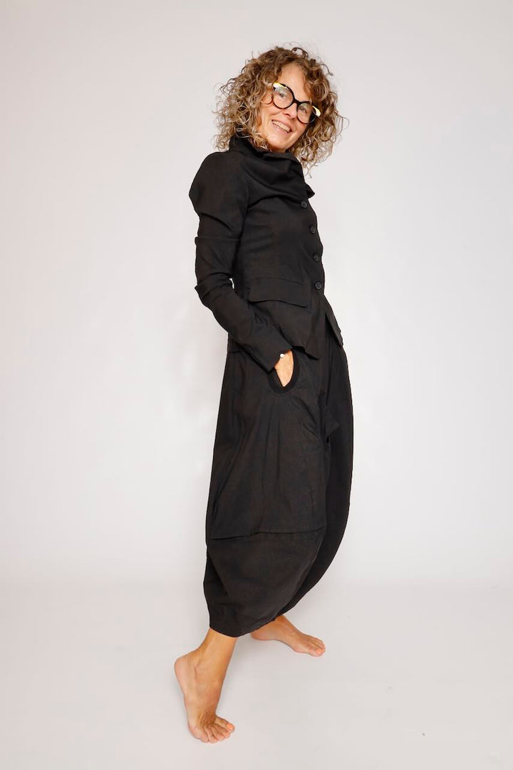 FALDA MIDI NEGRA CON BOLSILLO LATERAL 3440315