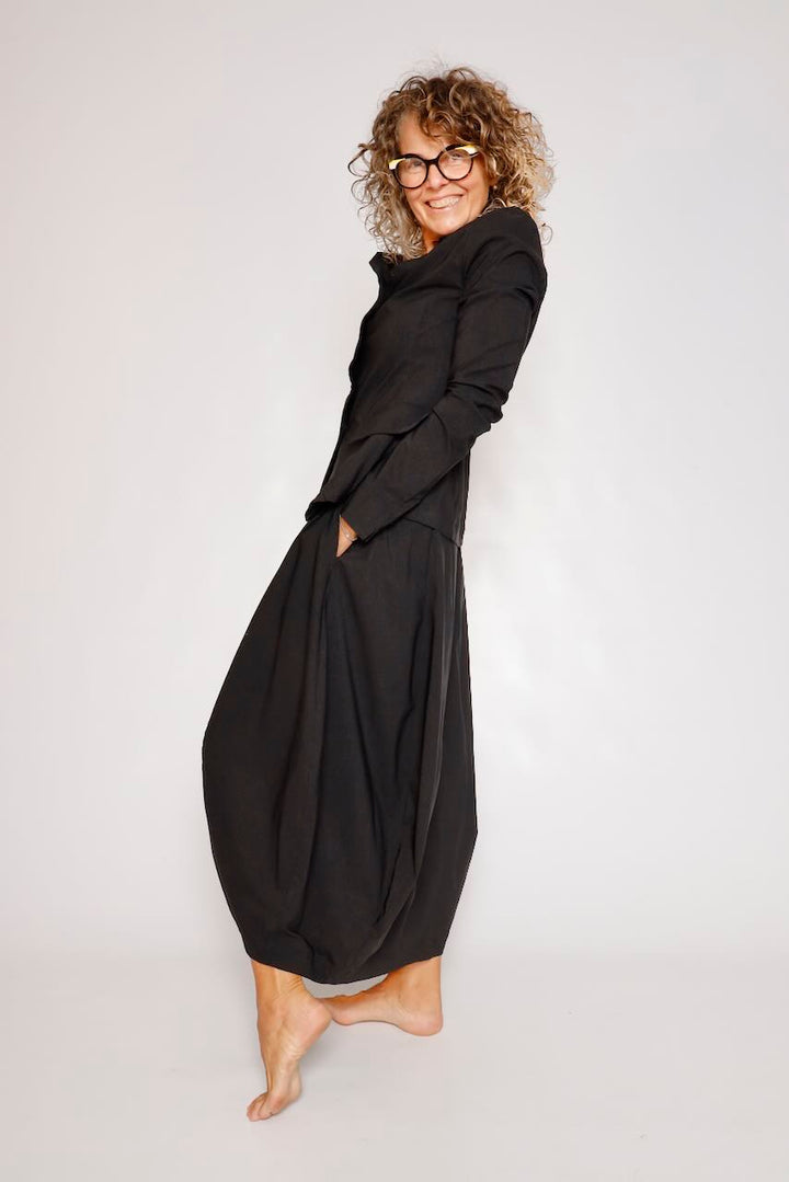 FALDA MIDI NEGRA CON BOLSILLO LATERAL 3440315