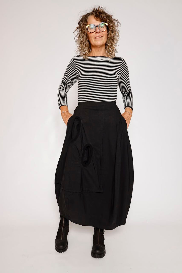 FALDA MIDI NEGRA CON BOLSILLO LATERAL 3440315
