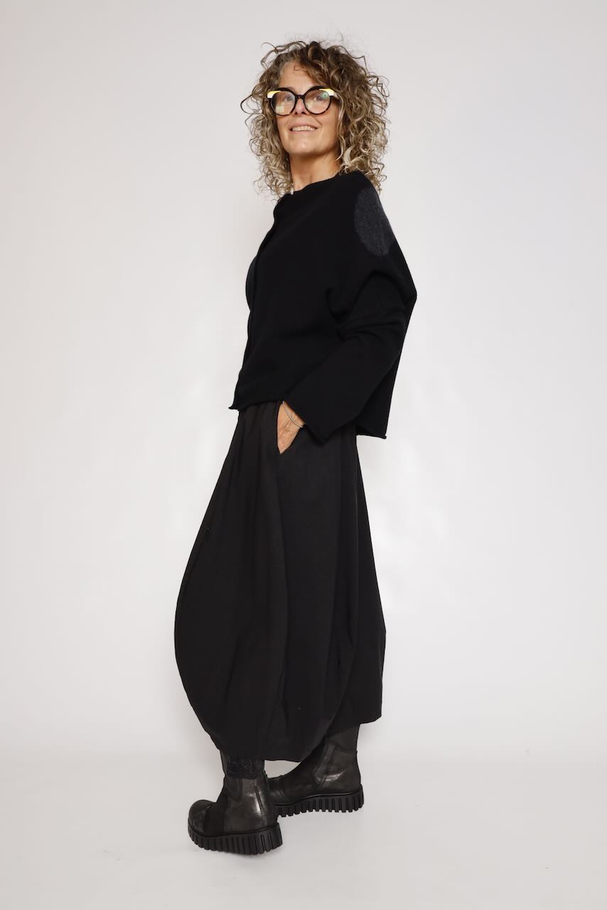 FALDA MIDI NEGRA CON BOLSILLO LATERAL 3440315