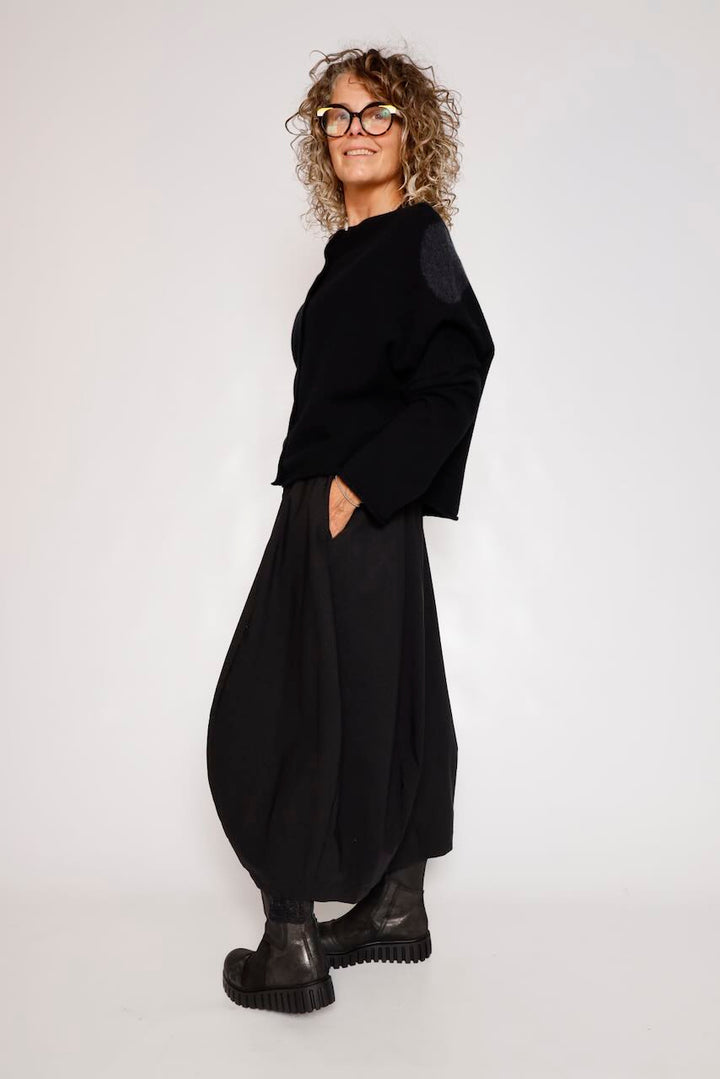 FALDA MIDI NEGRA CON BOLSILLO LATERAL 3440315