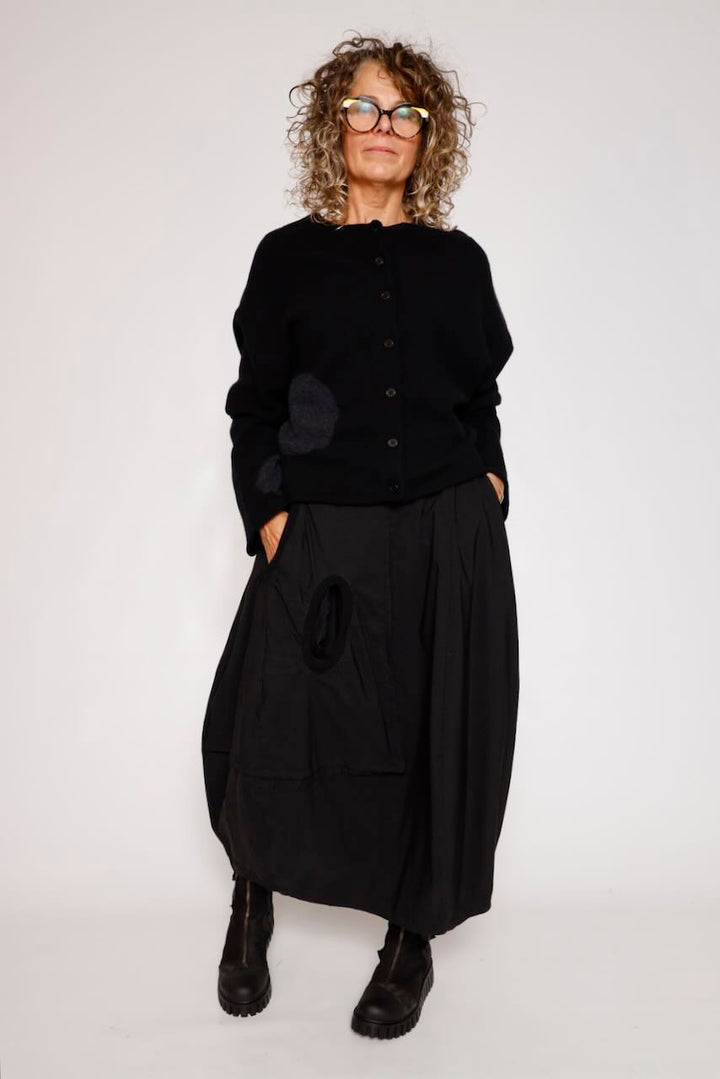 FALDA MIDI NEGRA CON BOLSILLO LATERAL 3440315