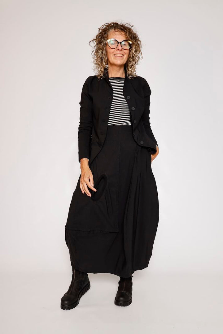 FALDA MIDI NEGRA CON BOLSILLO LATERAL 3440315