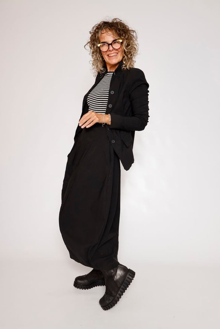 FALDA MIDI NEGRA CON BOLSILLO LATERAL 3440315
