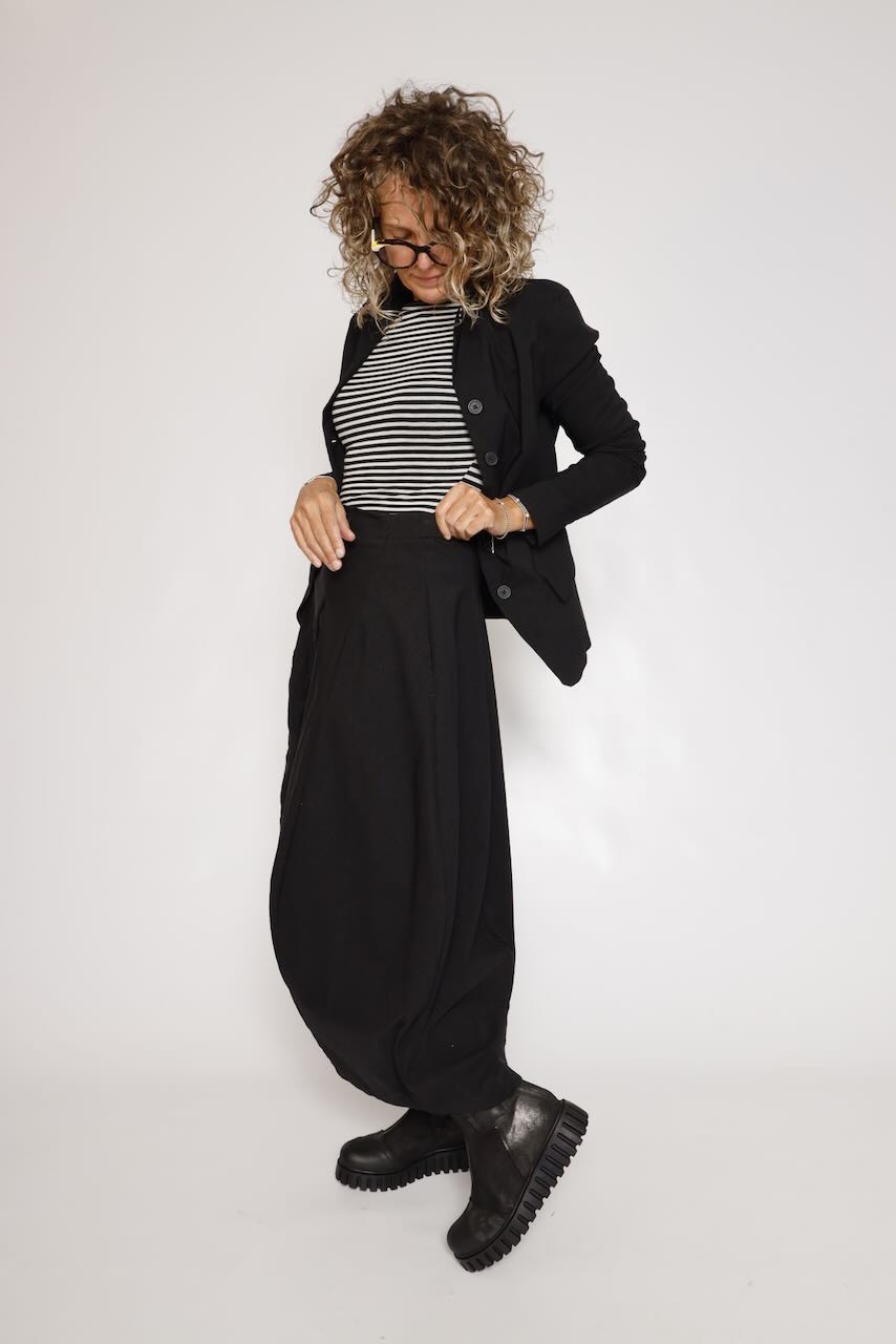 FALDA MIDI NEGRA CON BOLSILLO LATERAL 3440315