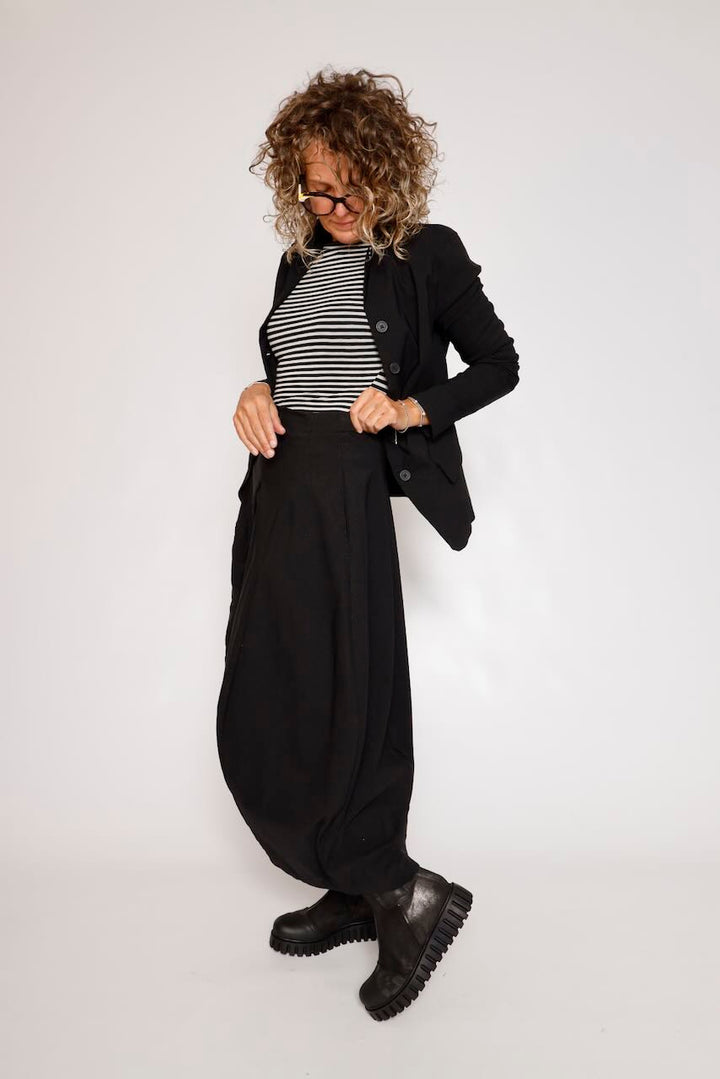 FALDA MIDI NEGRA CON BOLSILLO LATERAL 3440315